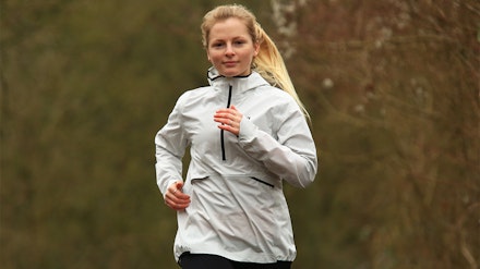 on running waterproof anorak woman runs in on running waterproof anorak