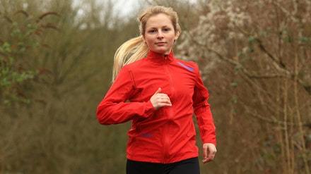 soar ultra jacket woman running in soar ultra jacket