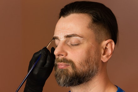 eyebrow-tinting-man man getting eyebrows tinted