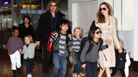 Angelina Jolie and Brad Pitt with their six children Angelina Jolie and Brad Pitt with their six children
