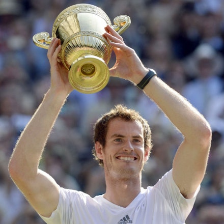 Andy Murray winning Wimbledon last year Andy Murray winning Wimbledon last year