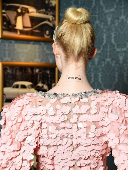 Elle-Fanning-Miu-Miu-Tattoo-Branding-Fashion-Couture Elle-Fanning-Miu-Miu-Tattoo-Branding-Fashion-Couture