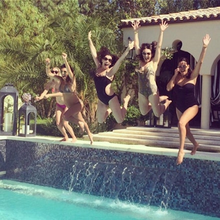 Kourtney flashed her growing baby bump Kourtney flashed her growing baby bump