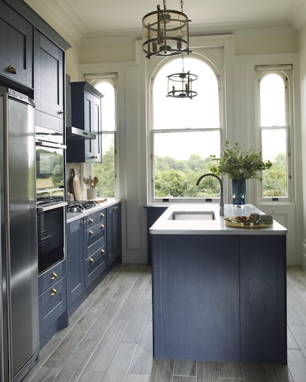 Milton Midnight Kitchen with navy cupboards and white marble tops Milton Midnight Kitchen with navy cupboards and white marble tops