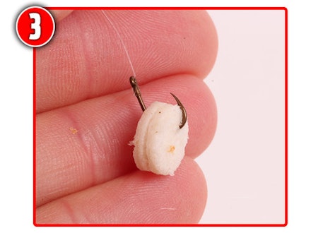 Double or triple-punch the bread to build up the thickness of the bait. Double or triple-punch the bread to build up the thickness of the bait.