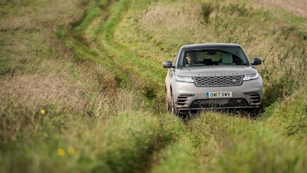 Range Rover Velar on a grassy greenlane Range Rover Velar on a grassy greenlane