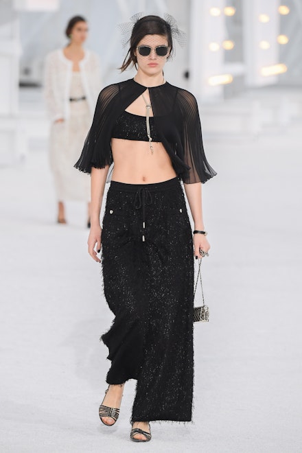 A model wearing all-black at Chanel SS21 A model wearing all-black at Chanel SS21
