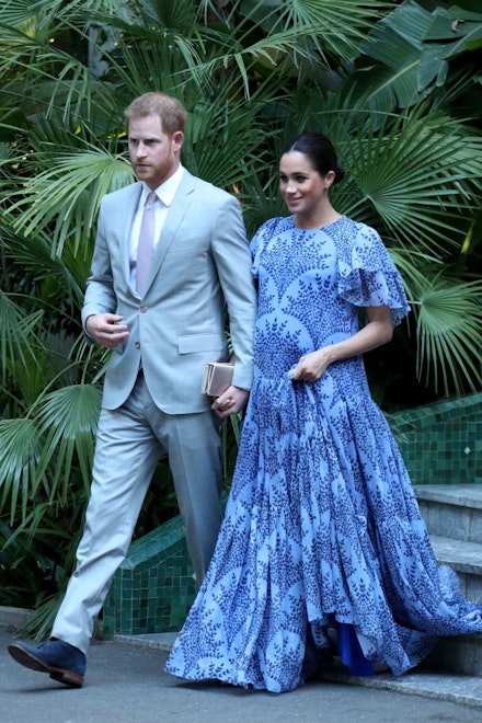 prince harry and Meghan Markle in blue floral dress prince harry and Meghan Markle in blue floral dress