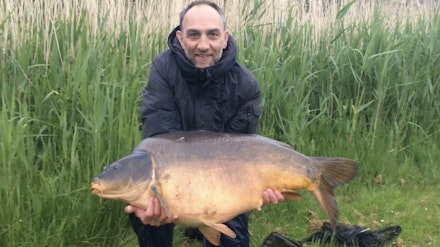Michael Moone and his 50lb-plus carp taken on float fishing tactics Michael Moone and his 50lb-plus carp taken on float fishing tactics