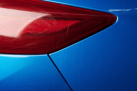 Some small scratches in a car's paintwork Some small scratches in a car's paintwork