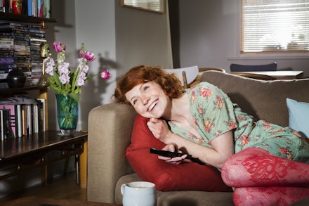 Woman watching tv Woman watching tv