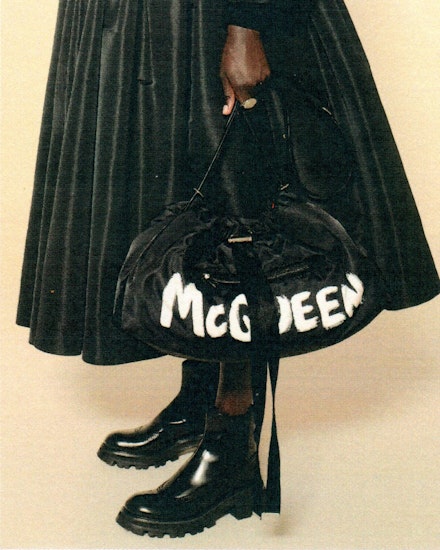 A model wearing clothes/accessories from McQueen Graffiti A model wearing clothes/accessories from McQueen Graffiti