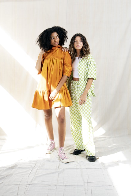 Models wearing clothes from The Loop Models wearing clothes from The Loop