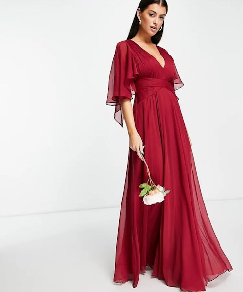 ASOS DESIGN Bridesmaid ruched bodice drape maxi dress with wrap waist and flutter cape sleeve in berry