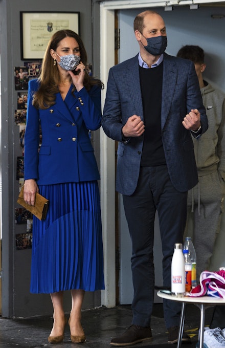 Kate Middleton wearing a royal blue skirt suit in May Kate Middleton wearing a royal blue skirt suit in May