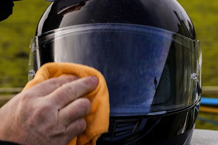 Applying Nikwax Visor proof with a microfibre cloth Applying Nikwax Visor proof with a microfibre cloth
