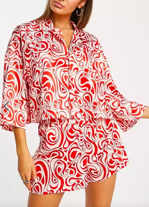 Monki recycled satin pyjama set in pink and red swirl print