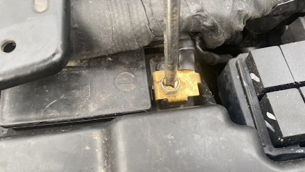 Unscrewing motorcycle battery terminal Unscrewing motorcycle battery terminal
