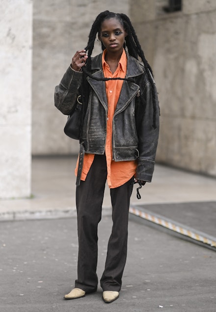 A model wearing a biker jacket A model wearing a biker jacket