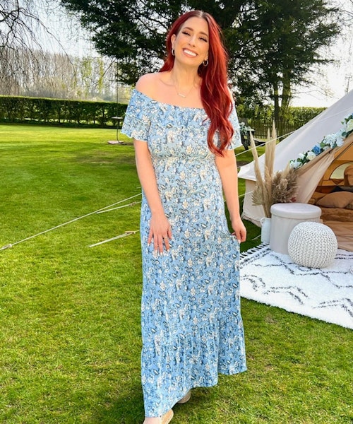A picture of Stacey Solomon wearing the Blue Paisley Bardot Midi Dress