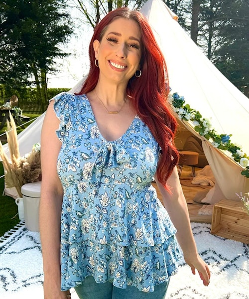 A picture of Stacey Solomon wearing the Blue Floral Frill Top