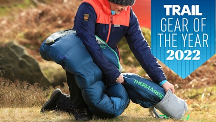 Hiker removing Therm-a-rest Hyperion from stuff sack Hiker removing Therm-a-rest Hyperion from stuff sack