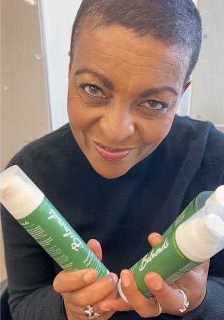 Adjoa Andoh holding two Balmoral products Adjoa Andoh holding two Balmoral products
