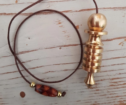 Isis brass pendlum