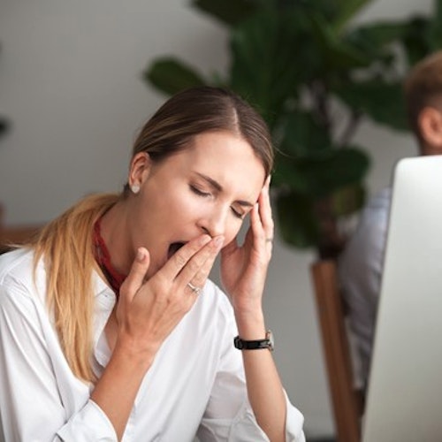 Woman yawning