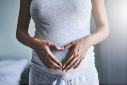 woman-holding-belly