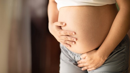 woman-holding-belly