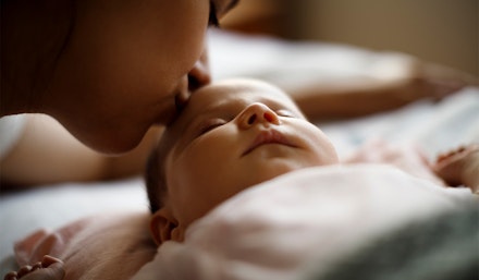 mum-kissing-baby mum-kissing-baby
