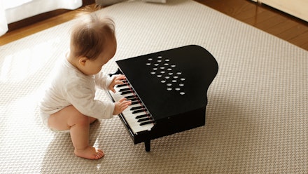 Baby-boy-playing-small-piano