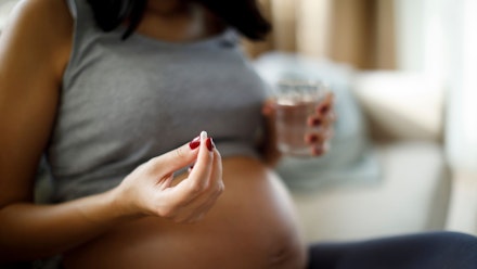 pregnant-person-pill