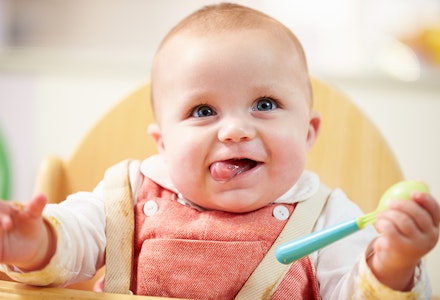 baby holding spoon baby led weaning baby holding a spoon
