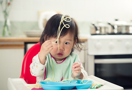 baby with pasta on head baby led weaning