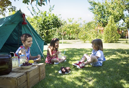 Children camping in the garden Children camping in the garden