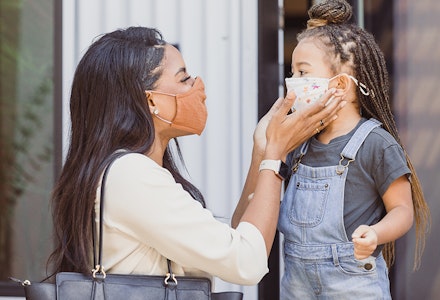 mum and daughter with face masks