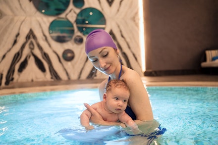 newborn baby swimming