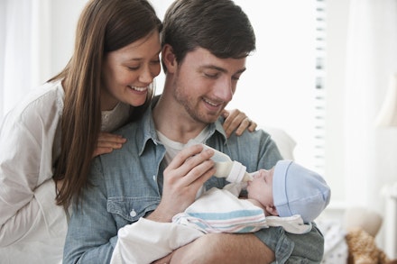 parents bottle feeding