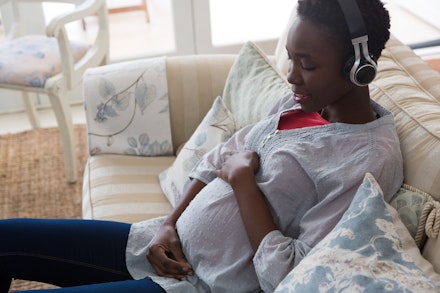 pregnant woman listening to music