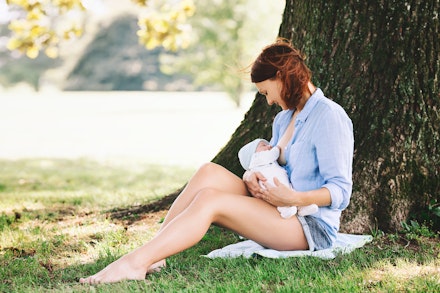 woman breastfeeding in summer