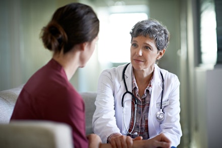 woman talking doctor