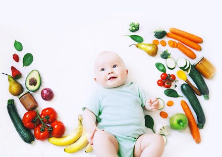 1) Don't rush! baby surrounded by fruit and veg