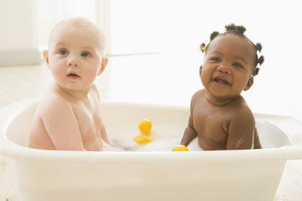 babies in bath together