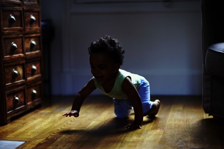 baby crawling and smiling