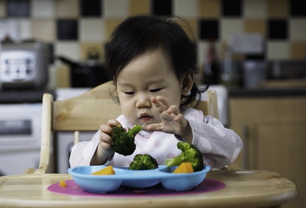 baby eating vegetables