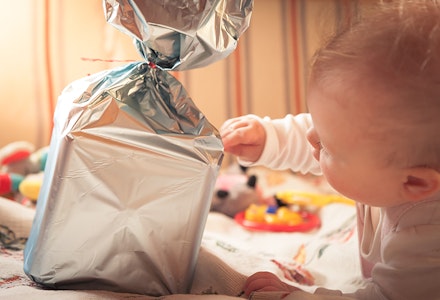 baby with wrapped present