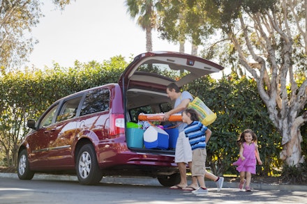 family holiday planning family packing car for holiday
