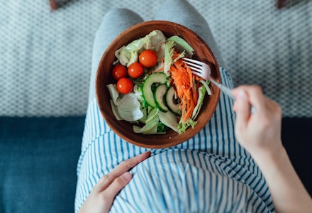 gettyimages pregnant woman eating salad